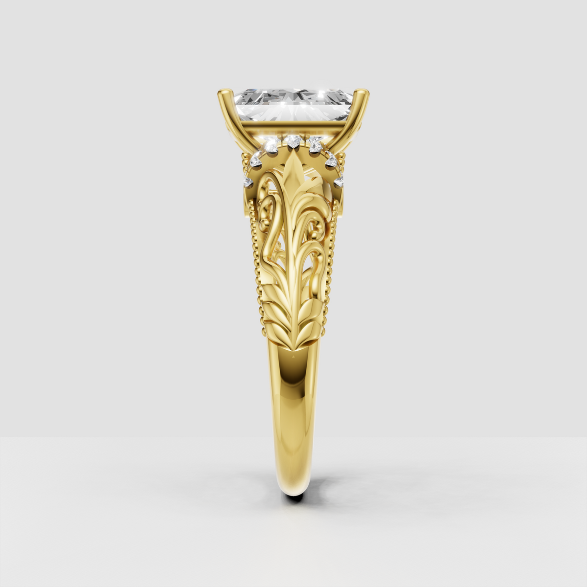 Four-prong radiant diamond engagement ring with yellow gold vintage-inspired band