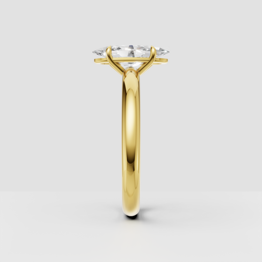 Elegant oval diamond engagement ring with polished yellow-gold solitaire setting