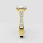 Radiant cut engagement ring with diamond channel band