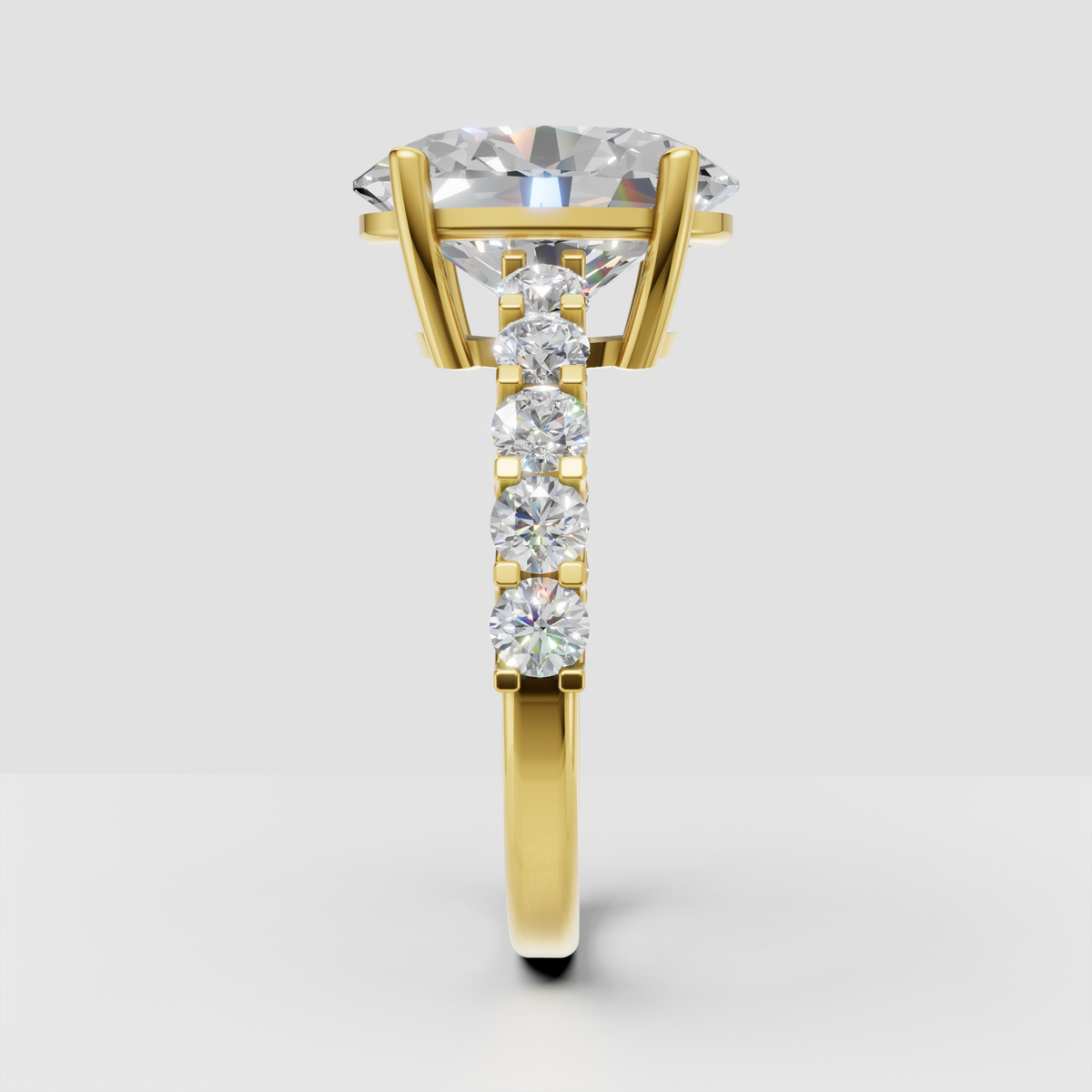 Yellow gold pear diamond ring with pavé split shank
