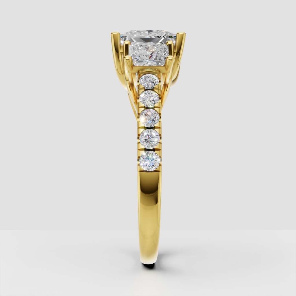 Square princess cut diamond three stone ring in gold