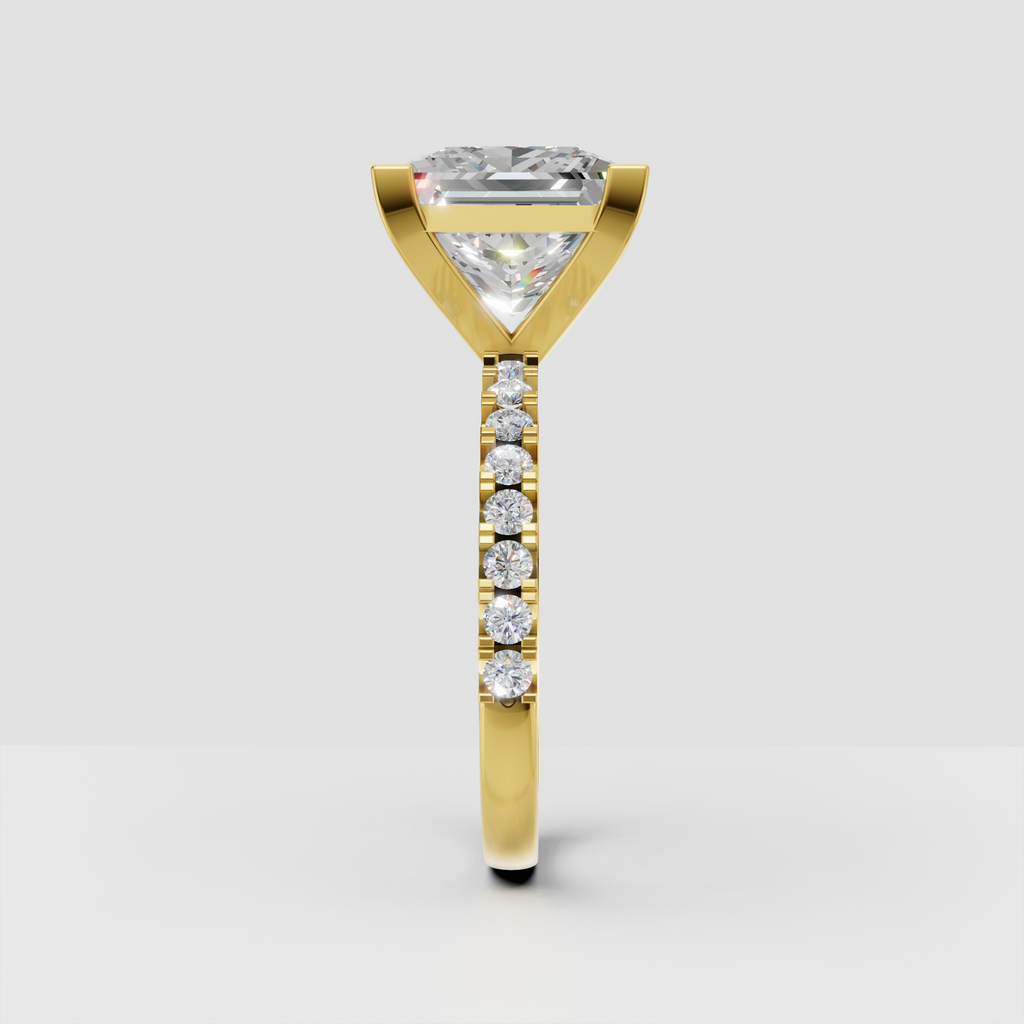 Yellow gold princess cut engagement ring with pave diamond band