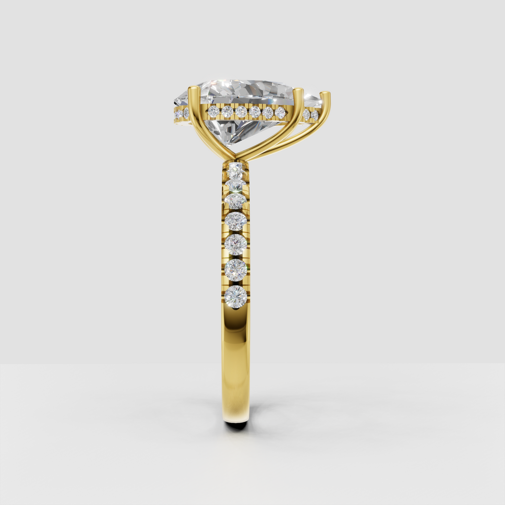 Yellow gold pear Diamond engagement ring with delicate pavé shoulders
