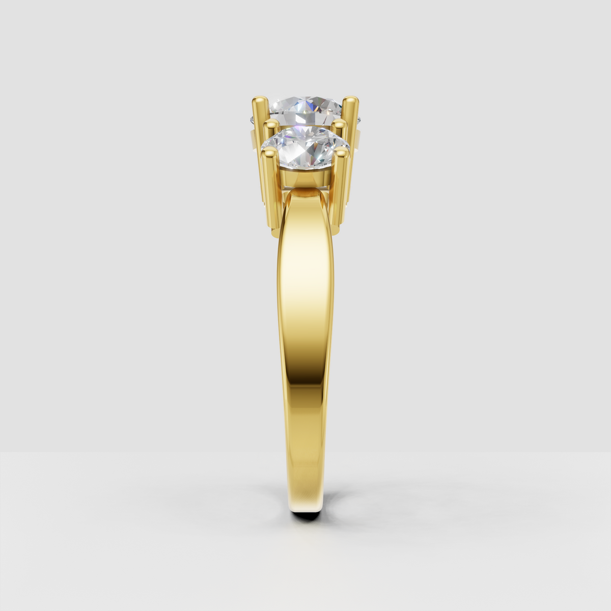 Three-stone round diamond engagement ring with prong setting