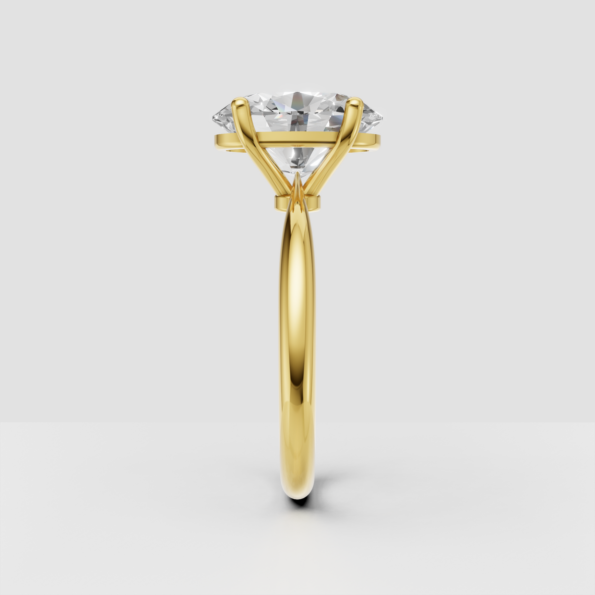 Yellow gold oval Diamond engagement ring with classic four-prong setting