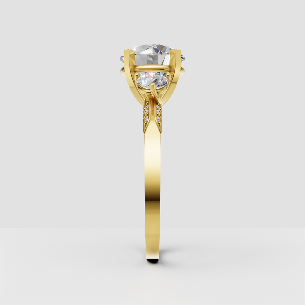 Round brilliant diamond ring with matching round side stones