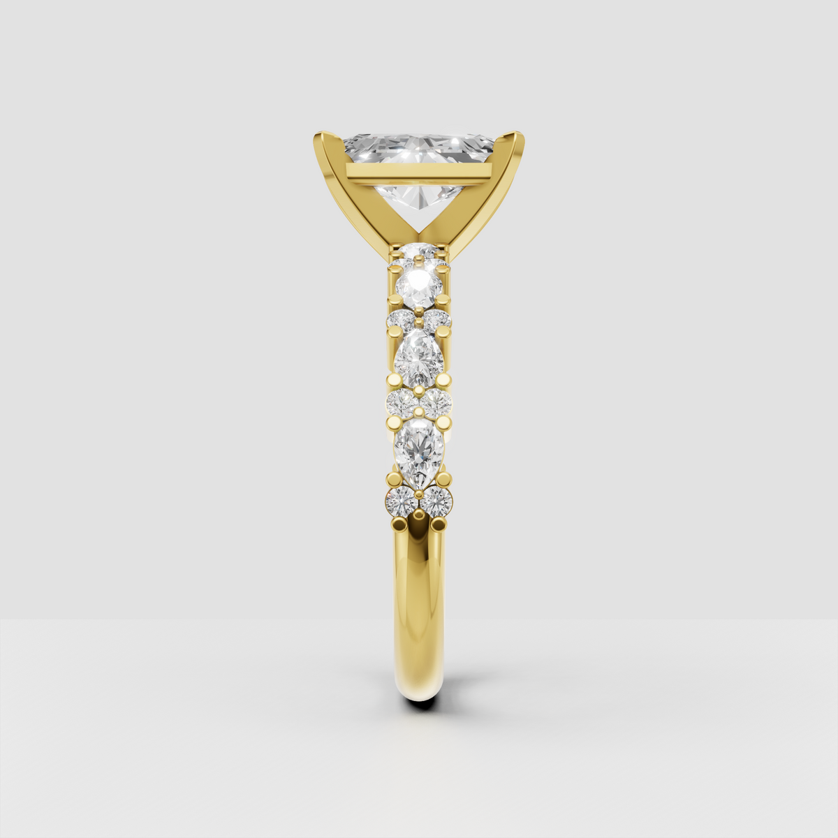 Radiant cut diamond ring featuring elegant accent diamonds on the shoulders