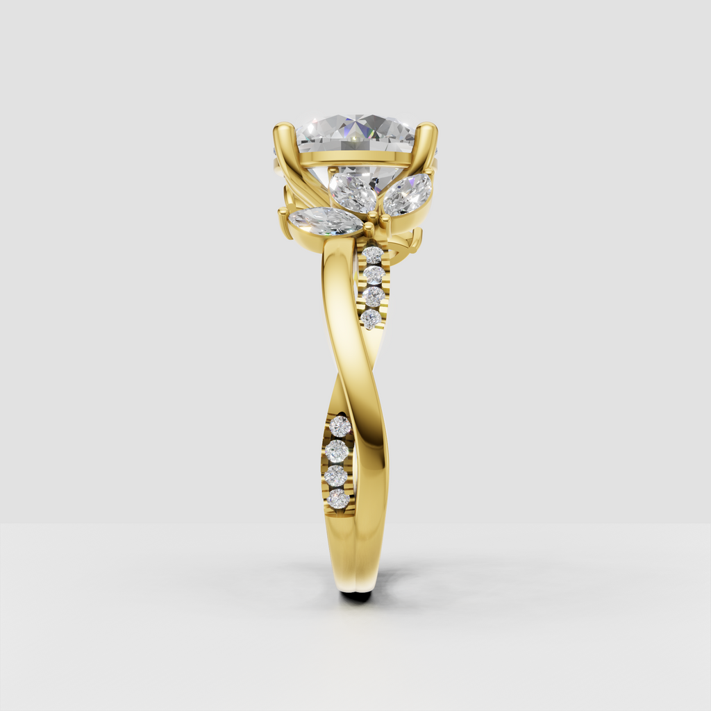 Round cut engagement ring featuring marquise and round accent stones