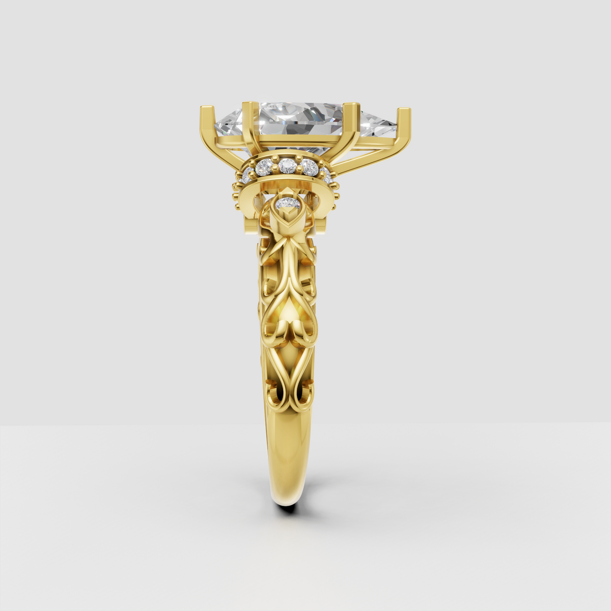 Yellow gold pear diamond ring featuring round halo accent stones
