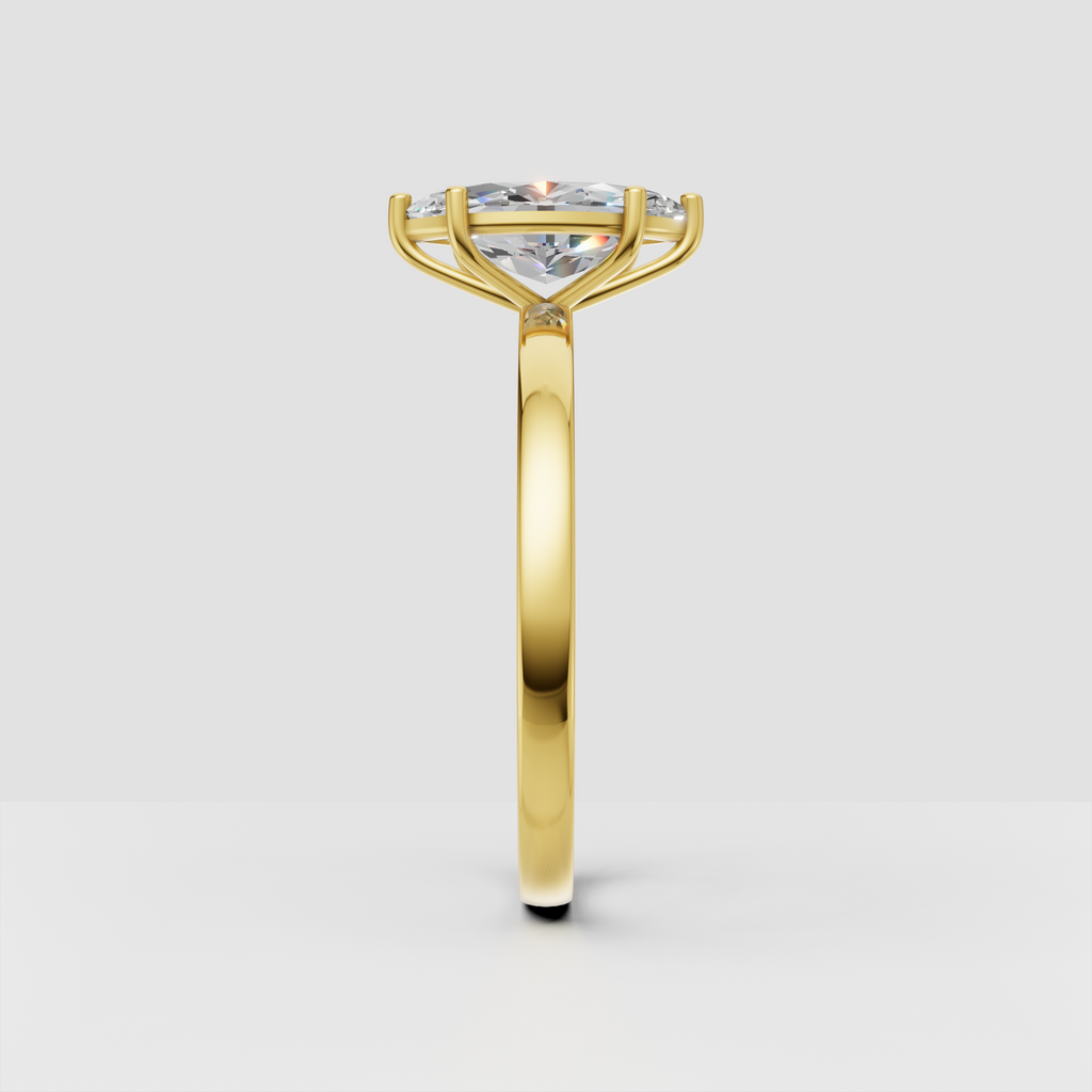 Elegant marquise engagement ring with polished gold band