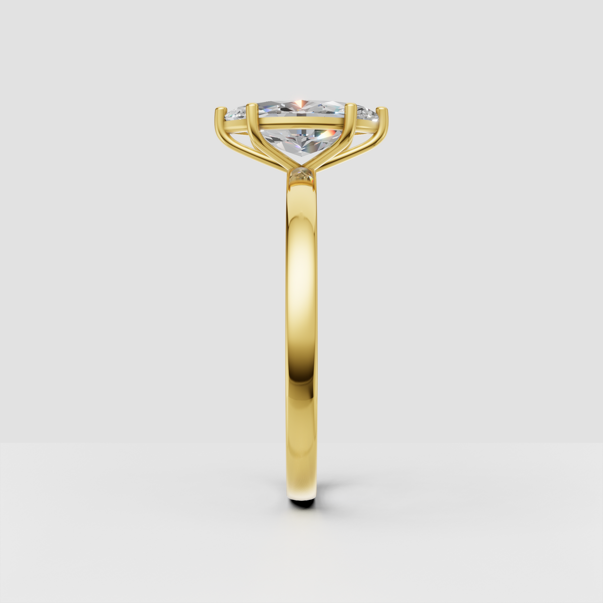 Elegant marquise engagement ring with polished gold band
