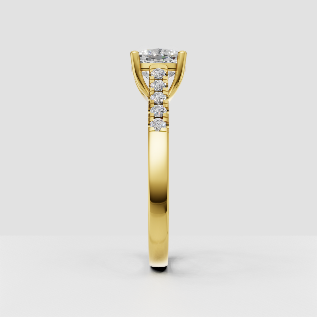 Cushion cut diamond ring featuring four rounded claw prongs