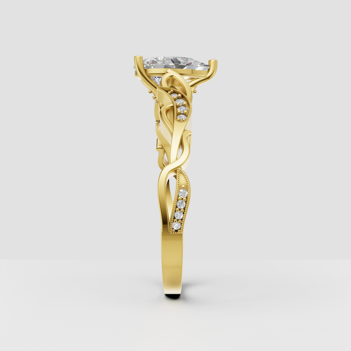 Yellow gold pear cut diamond ring with vintage filigree setting