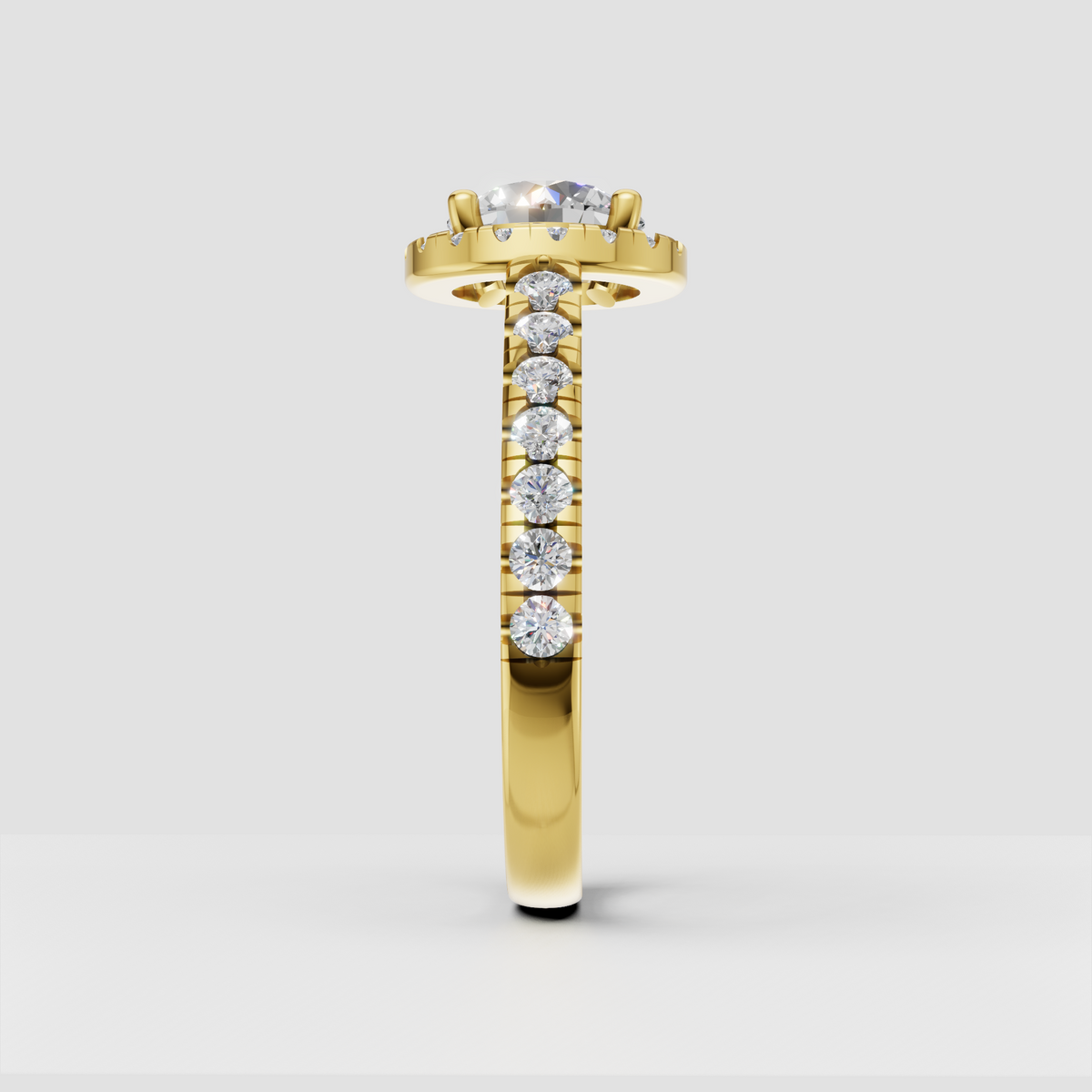 Yellow gold round diamond halo ring with sparkling accent stones