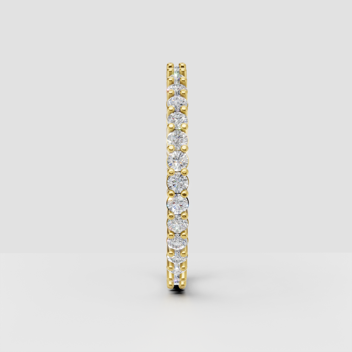 Yellow gold oval diamond ring with cathedral prong setting
