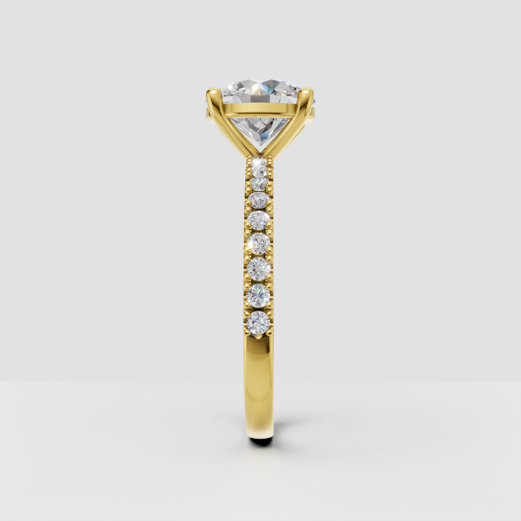 Vintage-inspired round diamond engagement ring with beaded milgrain band