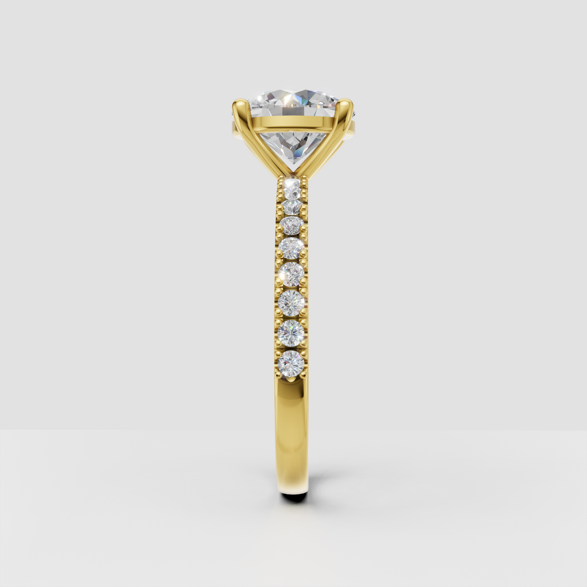 Vintage-inspired round diamond engagement ring with beaded milgrain band