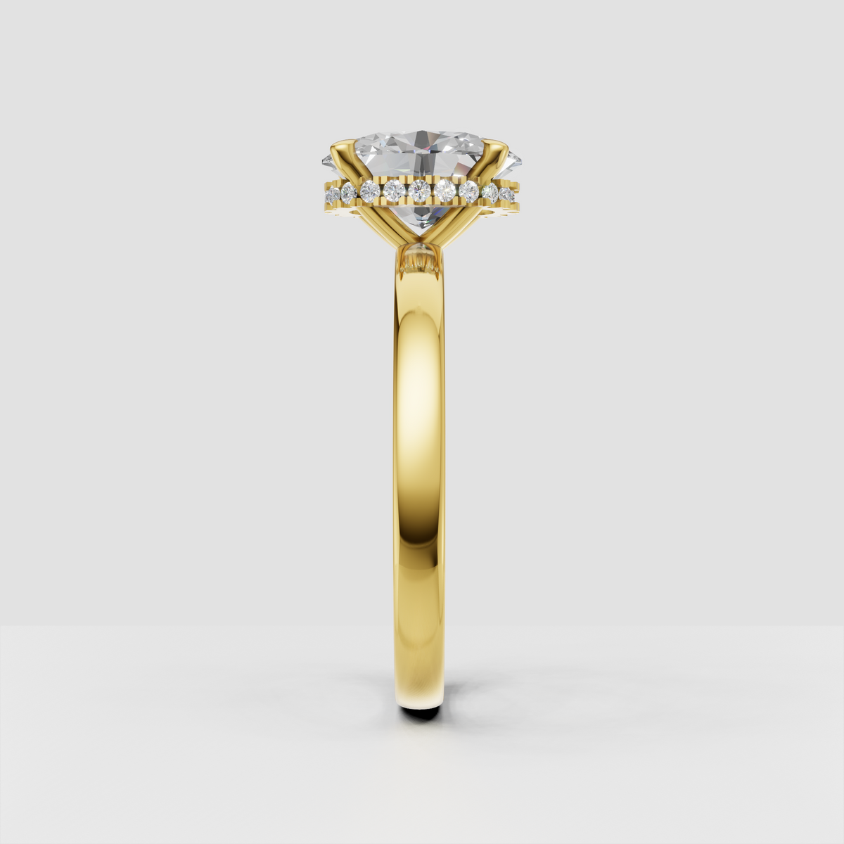 Oval cut diamond ring with four prong setting and hidden halo