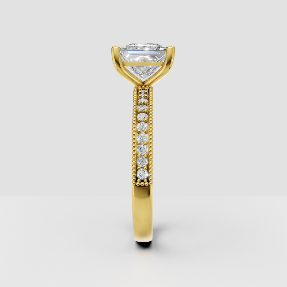 Square diamond engagement ring featuring four corner prongs and vintage detailing