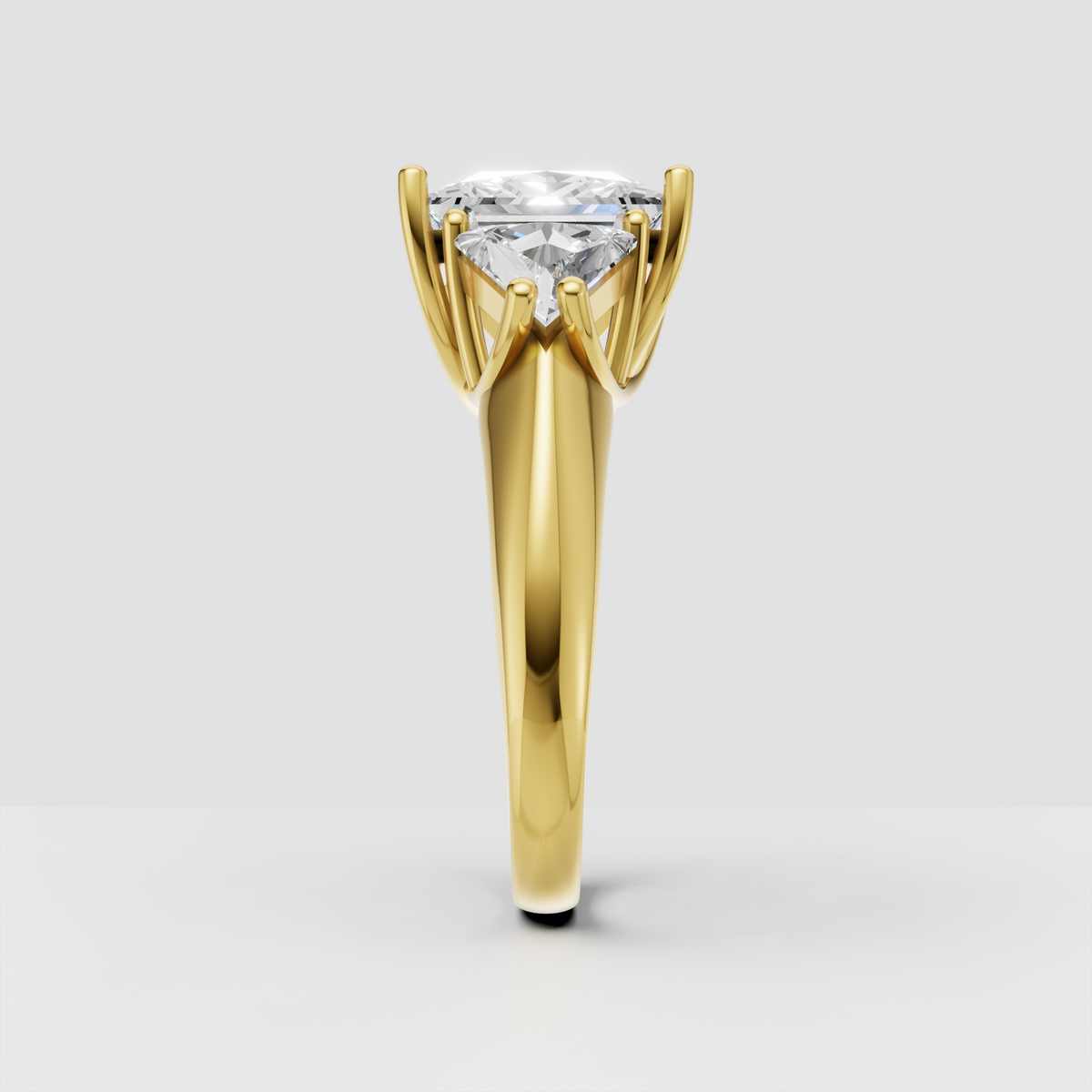 Yellow gold princess cut three stone diamond engagement ring