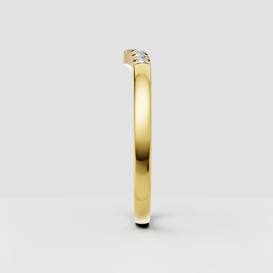 Round diamond wave ring with polished gold band and prong setting