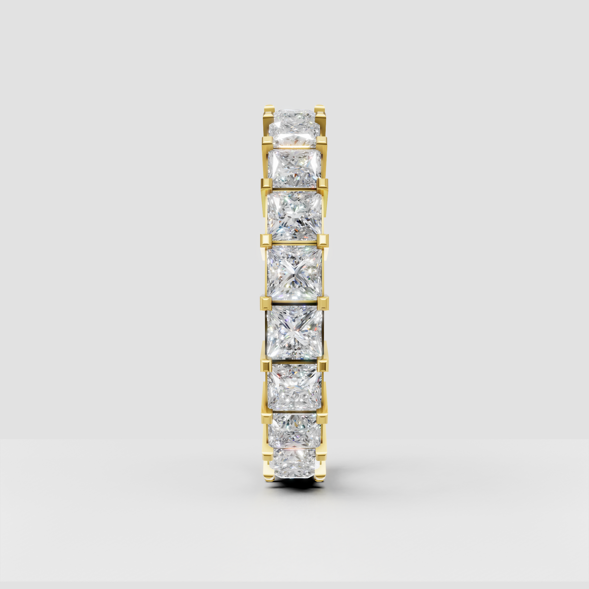 Full eternity diamond band with princess cut stones in four-prong settings