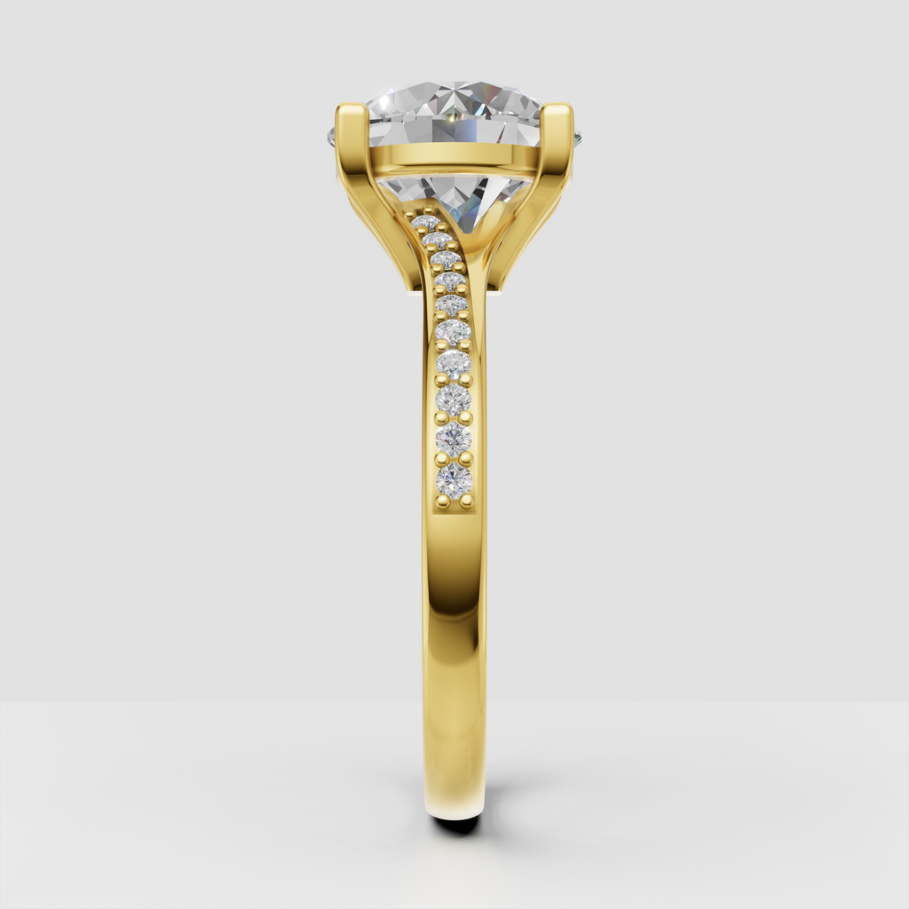 Yellow gold round diamond engagement ring with pavé shoulders