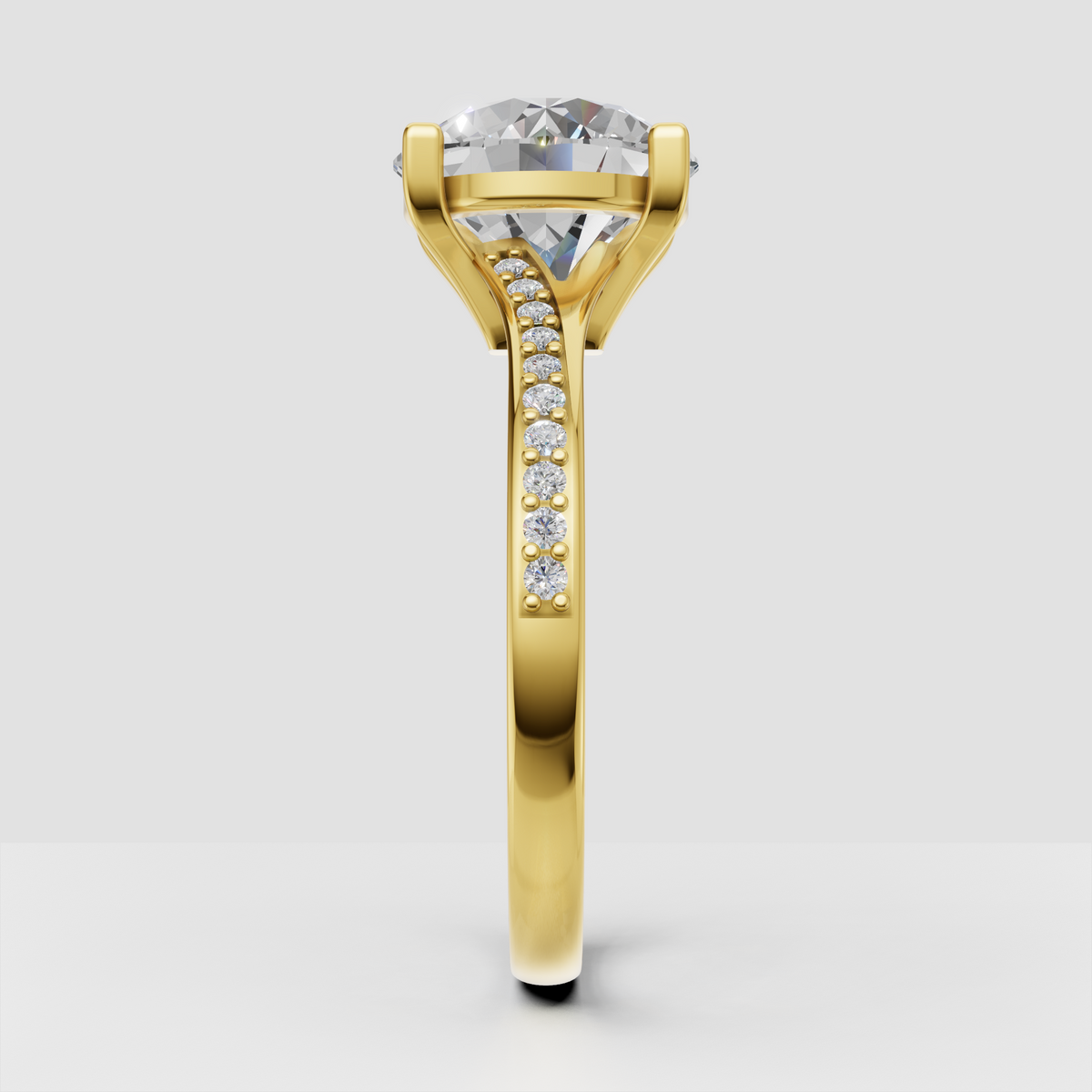 Yellow gold round diamond engagement ring with pavé shoulders
