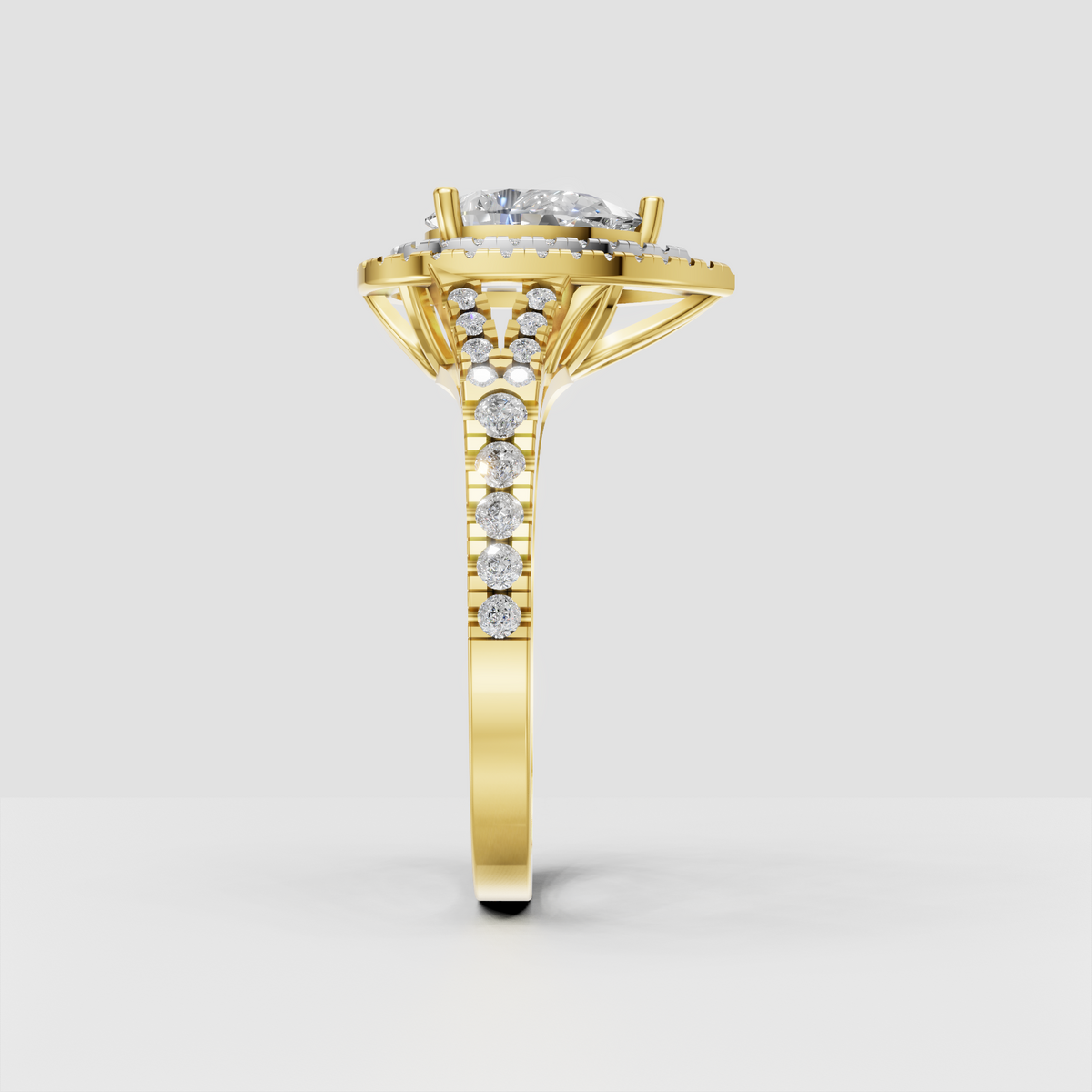 Yellow gold pear-shaped Diamond ring with double halo and cathedral-style setting