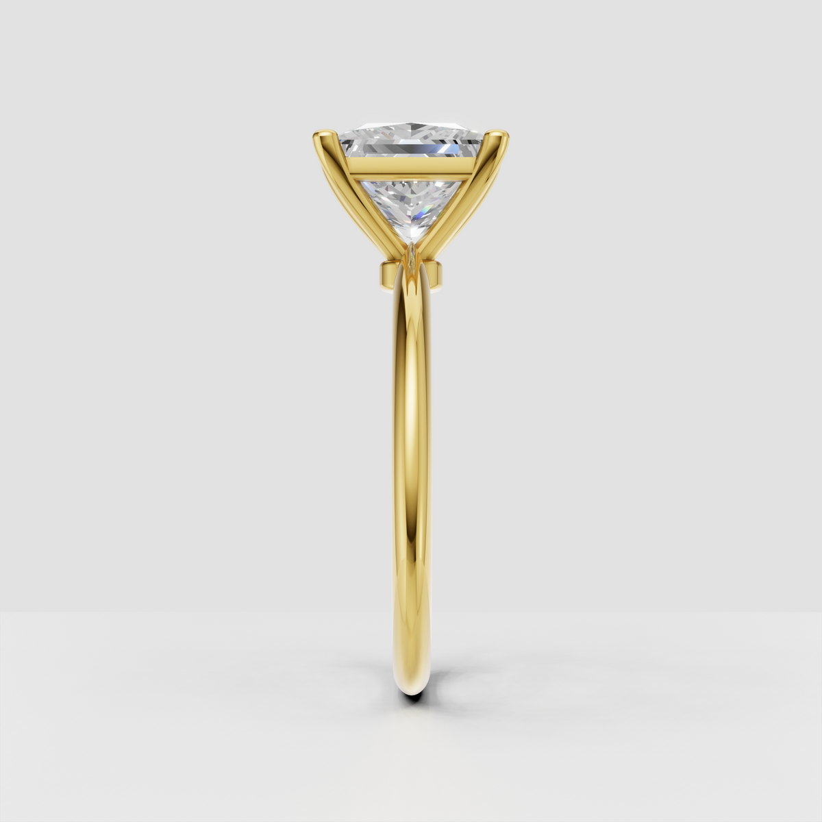 Elegant princess cut diamond ring in a classic four prong solitaire setting