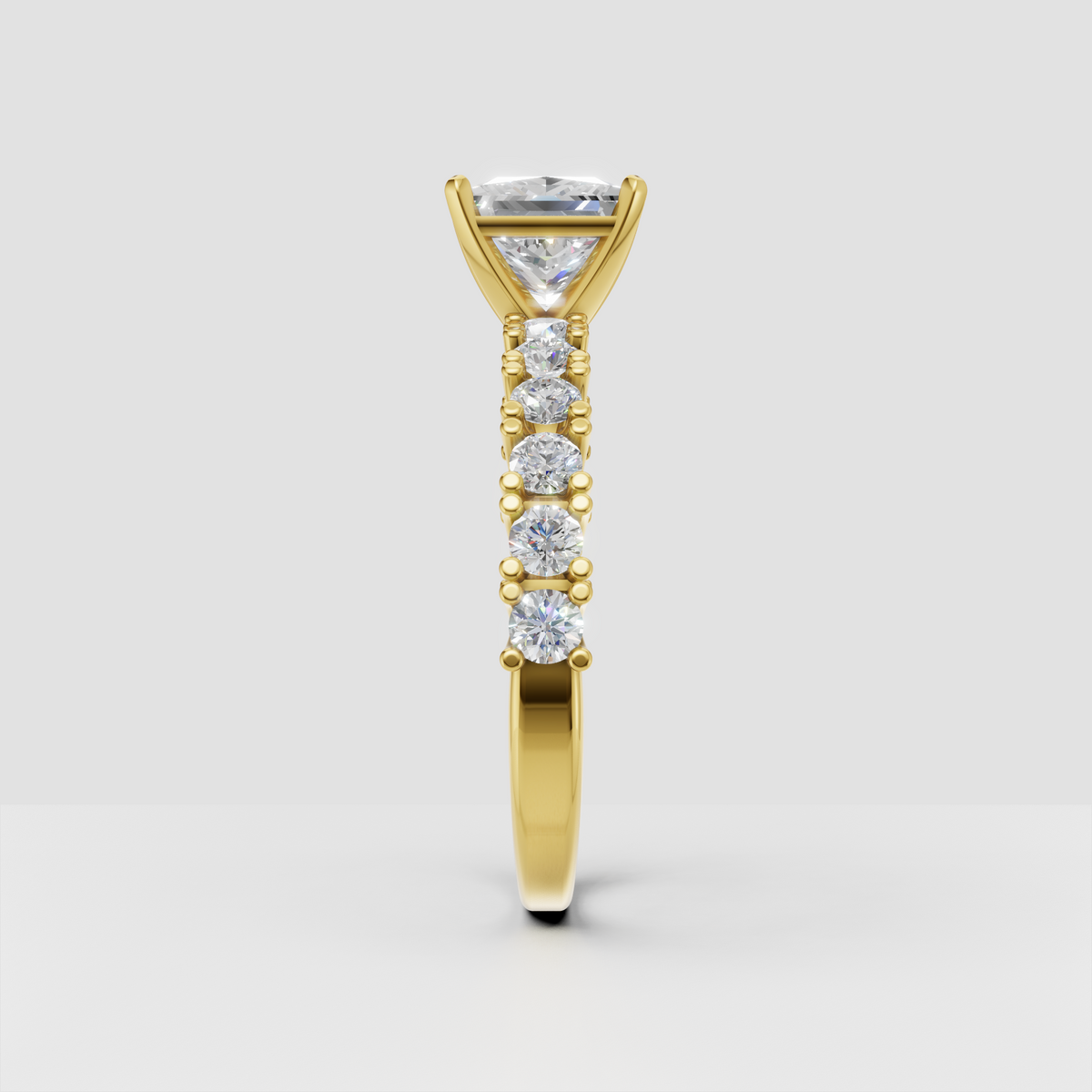 Square princess cut engagement ring with round side diamonds