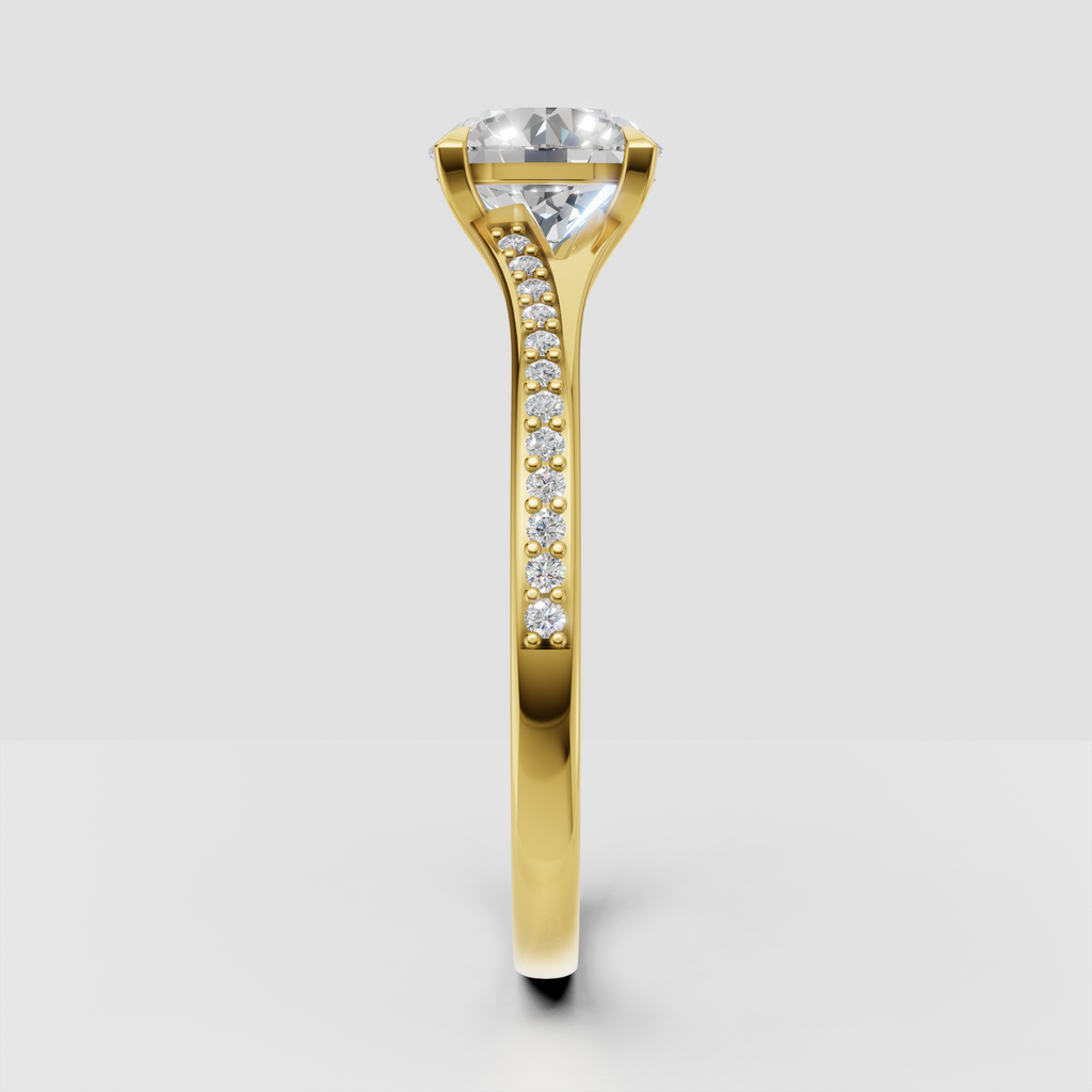 Yellow gold round diamond ring with four-prong center setting
