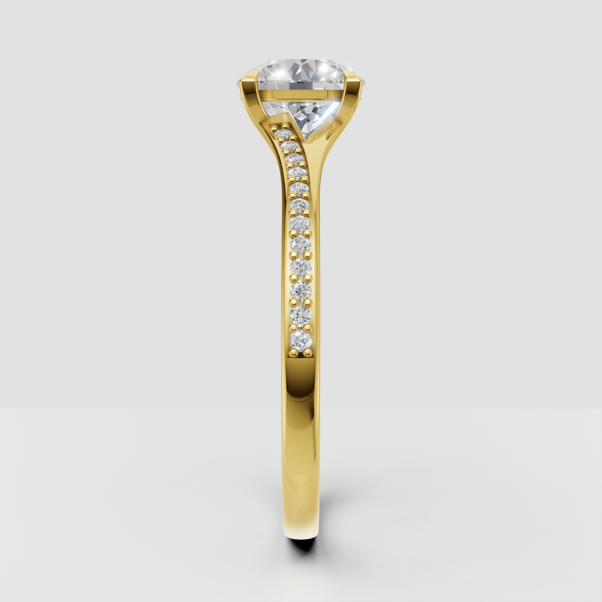 Yellow gold round diamond ring with four-prong center setting