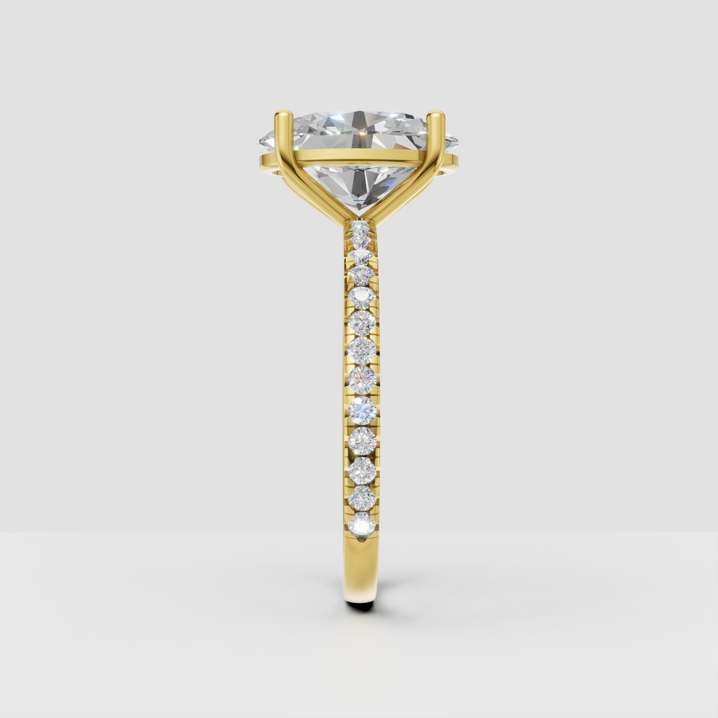 Yellow gold oval diamond ring with cathedral prong setting