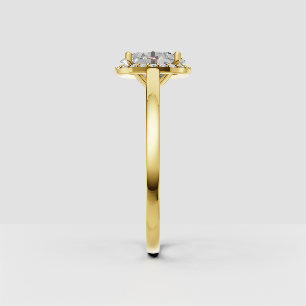 Yellow gold oval diamond ring with four-prong halo setting