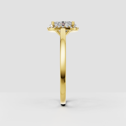 Yellow gold oval diamond ring with four-prong halo setting