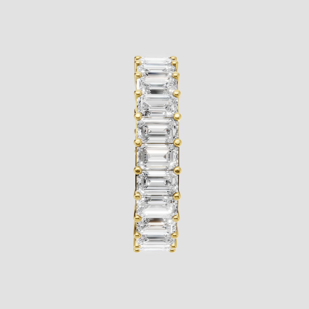 Vintage style emerald cut diamond wedding band in yellow gold