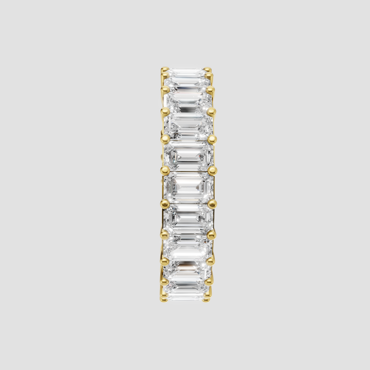 Vintage style emerald cut diamond wedding band in yellow gold