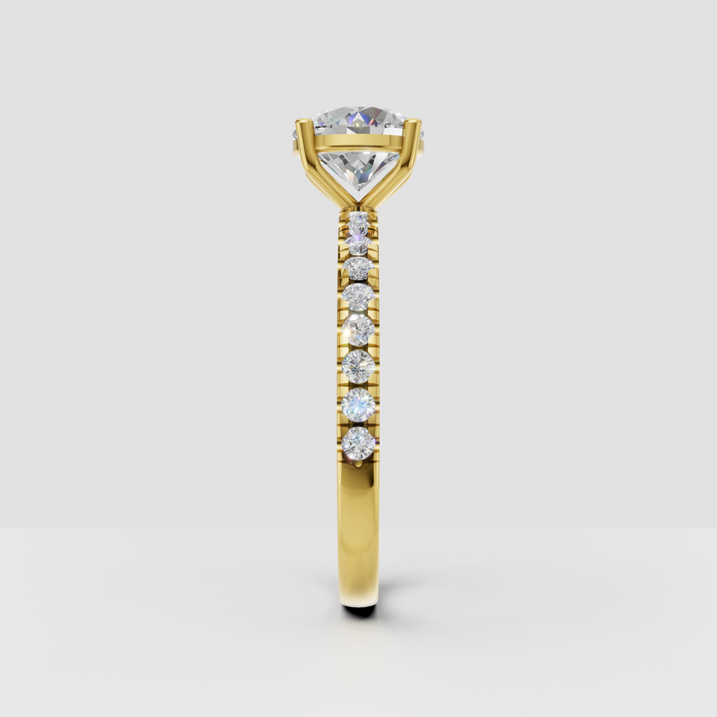 Yellow gold solitaire engagement ring with round center stone