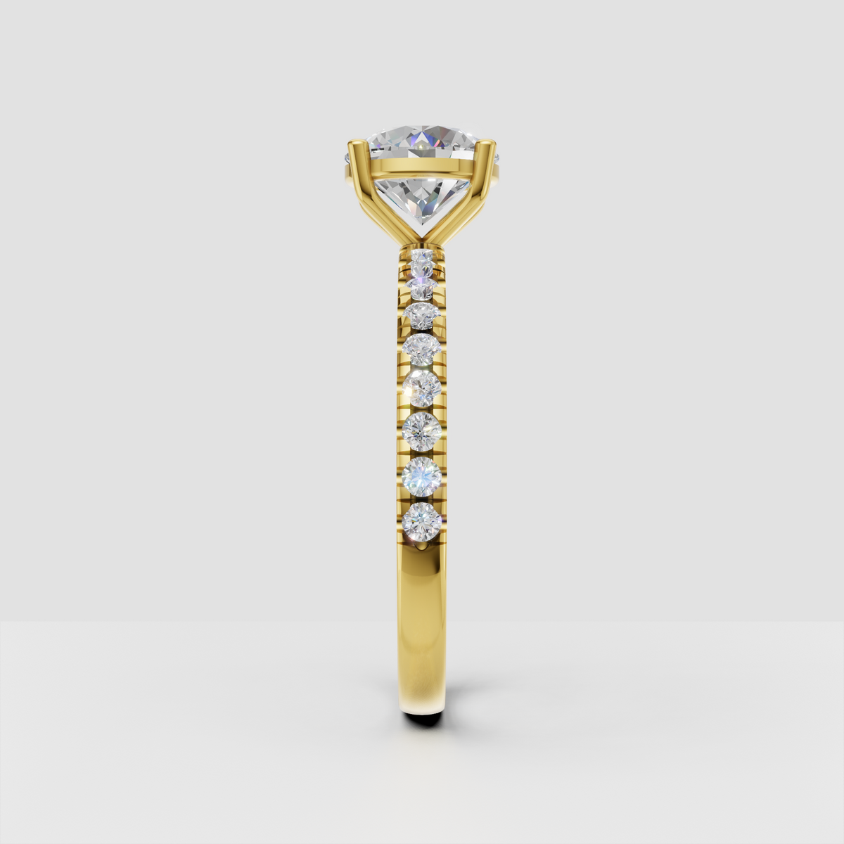 Yellow gold solitaire engagement ring with round center stone