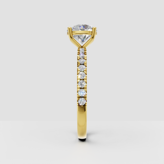 Yellow gold solitaire engagement ring with round center stone