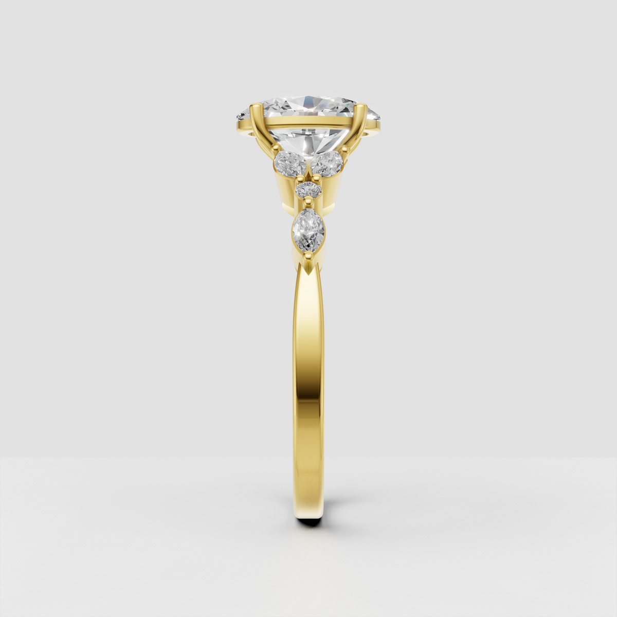 Yellow gold oval diamond ring with marquise and round accents