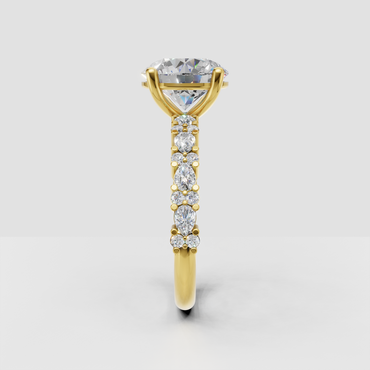 Round diamond engagement ring featuring delicate shoulder accents