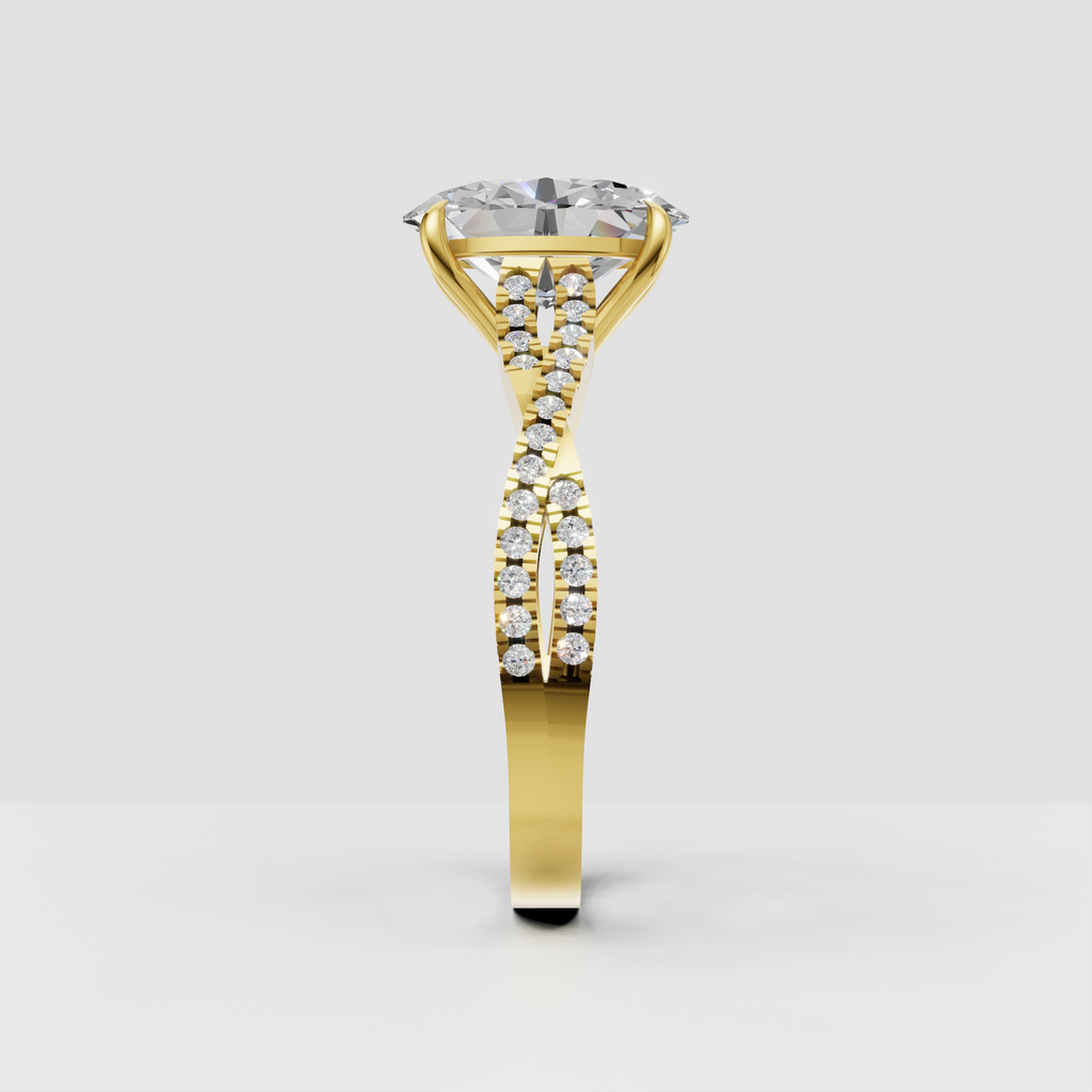 Yellow gold pear diamond ring with double row side stones