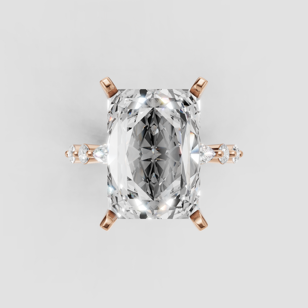 Elegant yellow gold radiant diamond ring with elevated four-prong setting