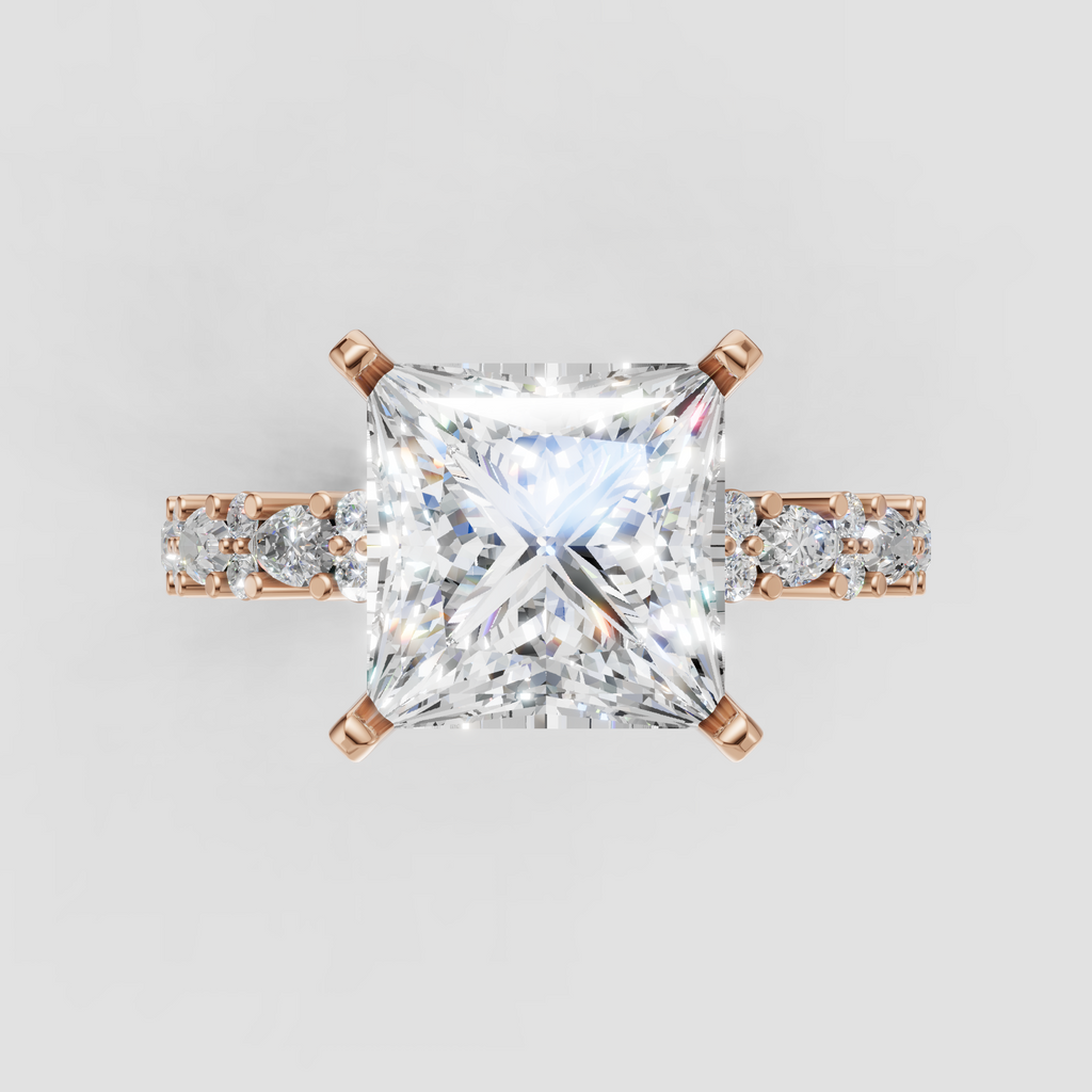 Princess cut diamond ring in yellow gold with alternating accent stones