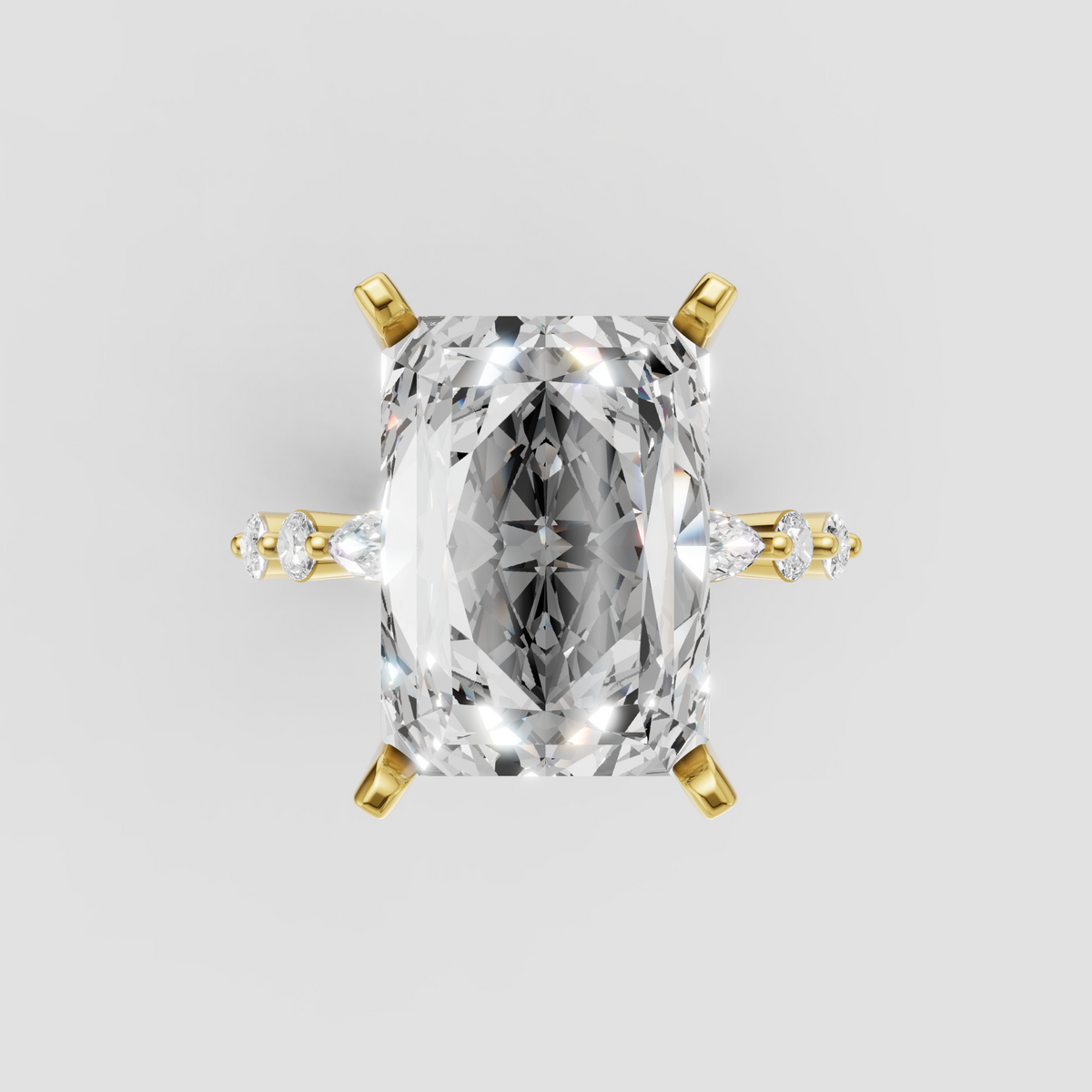 Radiant cut diamond engagement ring with four-prong yellow gold setting and side stones