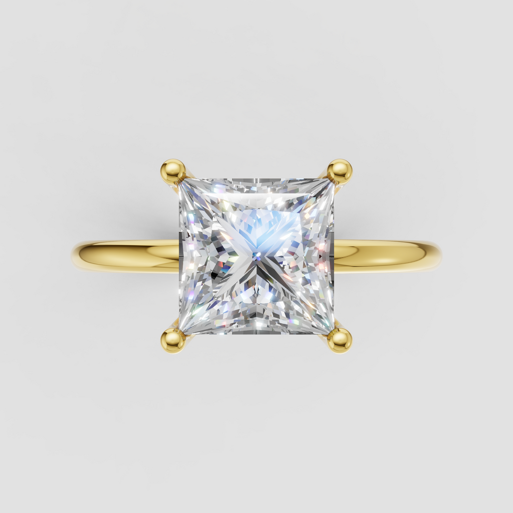Elegant princess cut diamond engagement ring with square center stone in yellow gold setting