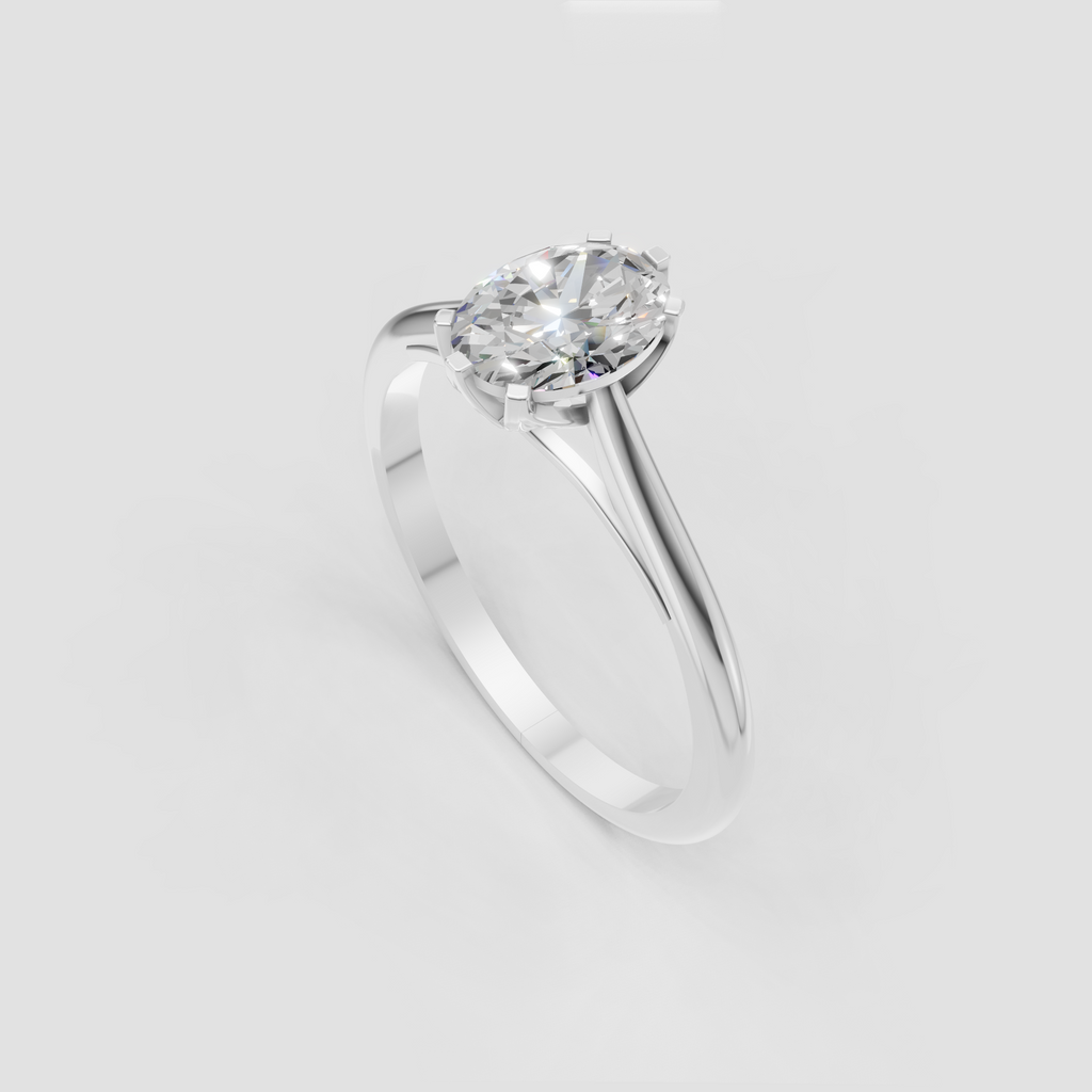 Oval center diamond secured by six gold prongs