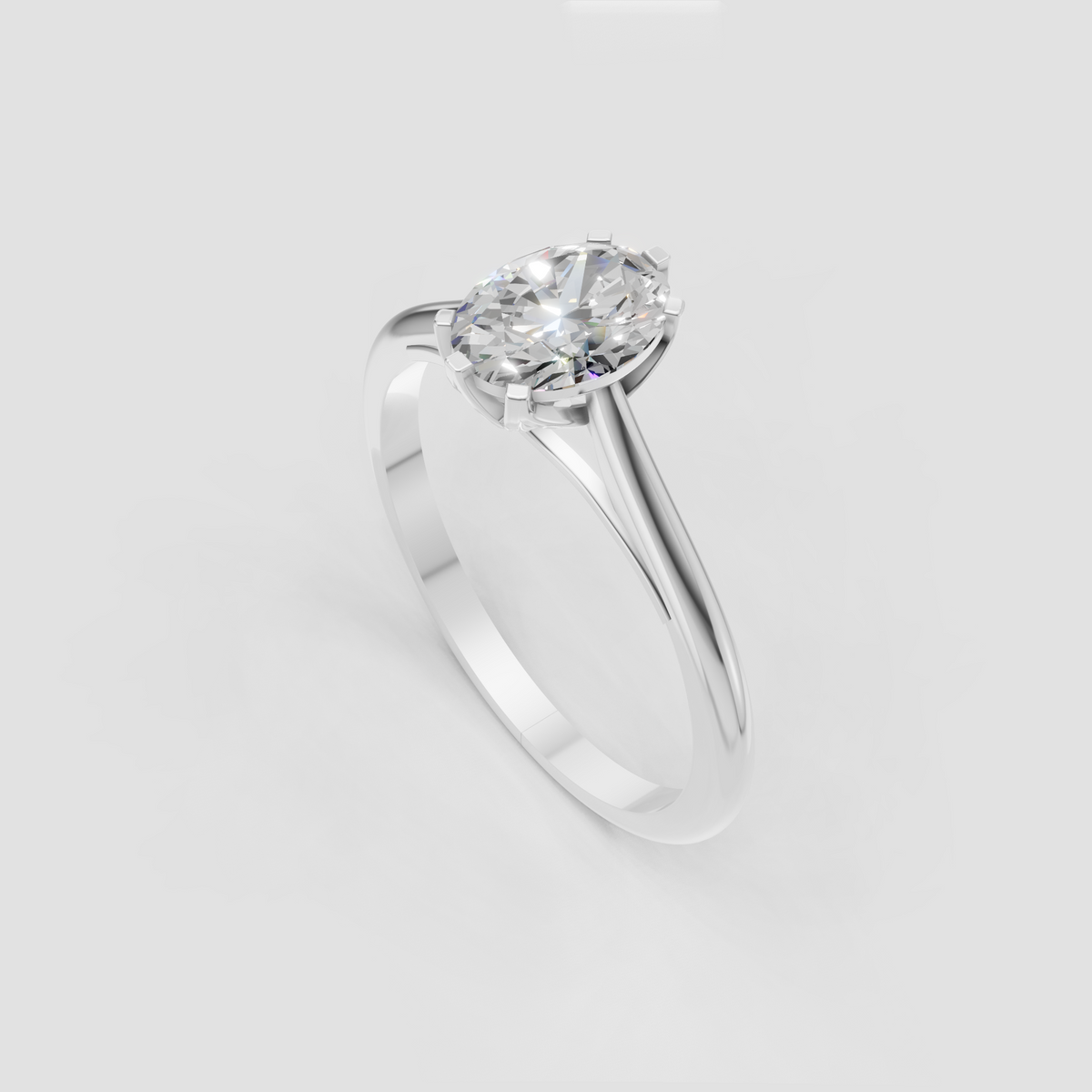 Oval center diamond secured by six gold prongs